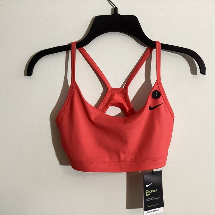 Nike Neon Pink Sports Bra. Never Worn, Still Has Tags. Has Pockets For Removable Cups, But Does Not Come With Cups. Nike Sports Bra With Built-in Bra For Training, Nike Activewear With Built-in Bra For Workout, Nike Seamless Sports Bra For Training, Nike Seamless Activewear For Training, Casual Light Support Bra For Workout, Casual Workout Bra With Light Support, Nike Seamless Sports Bra, Nike Seamless Activewear For Gym, Nike Bra Friendly Activewear For Workout