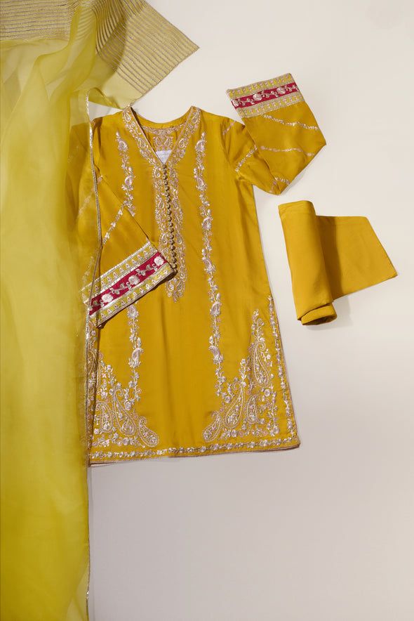 Curated on pure raw silk 58 Gms in an alluring tone of poison green, this design features hand/ada work done by our expert artisans alongside embroidered details. An absolutely beautiful three piece for your festive events. The length of the long kameez is 46 inches. Order Duration: 4 to 6 weeks Yellow Silk Sharara With Dabka Work, Pista Green Silk Sharara For Eid, Yellow Silk Sharara With Dabka, Yellow Silk Sharara With Dabka Details, Yellow Raw Silk Anarkali Set With Dabka Work, Elegant Yellow Kurta With Mirror Work, Yellow Silk Traditional Wear With Dabka Work, Yellow Raw Silk Kurta With Dabka, Yellow Raw Silk Kurta With Dabka Detailing