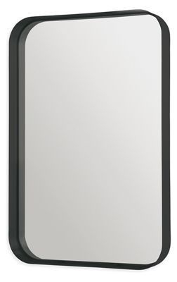 a black framed mirror on a white wall