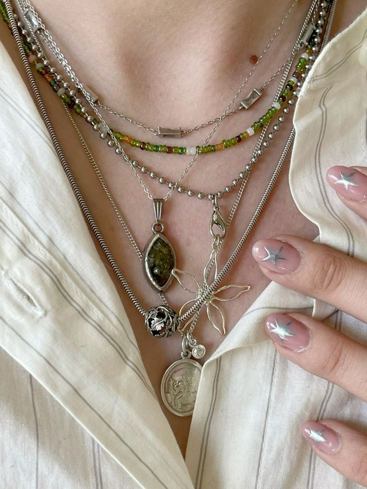 Statement Jewelry Aesthetic, Aesthetic Necklace Layering, Stacked Jewelry Necklaces Silver, Silver Jewelry Stacking, Maximalist Necklace Layering, Colourful Silver Jewelry, Rings Stacking Ideas, Silver Girl Aesthetic Jewelry, Gold And Silver Mixed Jewelry Aesthetic