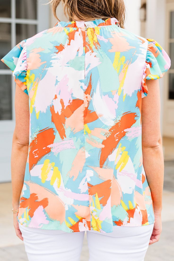 Expertly designed with ruffle detailing and an abstract pattern, our Kawa Island Top in bold mint orange is a must-have for any fashion-forward individual! The flutter sleeves add a touch of sass, while the versatile styling options make it perfect for any occasion, from brunch dates to a classy chic look with white denim or distressed skinnies! 100% Polyester Trendy Multicolor Ruffle Sleeve Blouse, Trendy Multicolor Blouse With Flutter Sleeves, Trendy Multicolor Flutter Sleeve Blouse, Orange Short Sleeve Blouse With Ruffles, Orange Ruffled Short Sleeve Blouse, Multicolor Print Tops With Abstract Pattern For Spring, Spring Multicolor Abstract Print Tops, Spring Multicolor Print Top With Abstract Pattern, Spring Tops With Multicolor Abstract Print