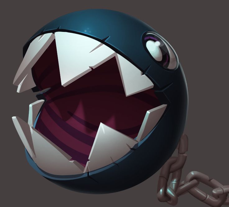 an image of a ball with teeth and chains attached to it's sides, in the shape of a shark mouth