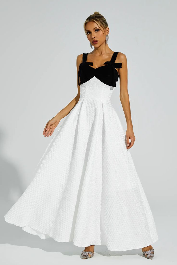 The Camp White Bow Tie Slip Dress exudes an elegant and sophisticated charm. Crafted with utmost care, this dress is perfect for special occasions. Its unique design features beautiful bows tie and delicate straps. With a touch of French chic, this dress embodies the essence of a refined and graceful woman. Ideal for formal events, birthdays, or as a hostess outfit, this dress will elevate your look with its undeniable luxury and finesse.  Dress Length: Approx 150cm Materials: Polyester Gentle D Elegant A-line Dresses With Bow Straps, Evening Dress With Bow And Sweetheart Neckline, Party Evening Dress With Bow And Sweetheart Neckline, Party Evening Dress With Sweetheart Neckline And Bow, A-line Evening Dress With Bow For Party, Sweetheart Neckline Evening Dress With Bow For Party, Chic Evening Dress With Bow For Prom, Elegant A-line Dresses With Detachable Bow, Sleeveless Dress With Detachable Bow For Gala