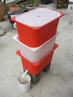 three red and white containers stacked on top of each other