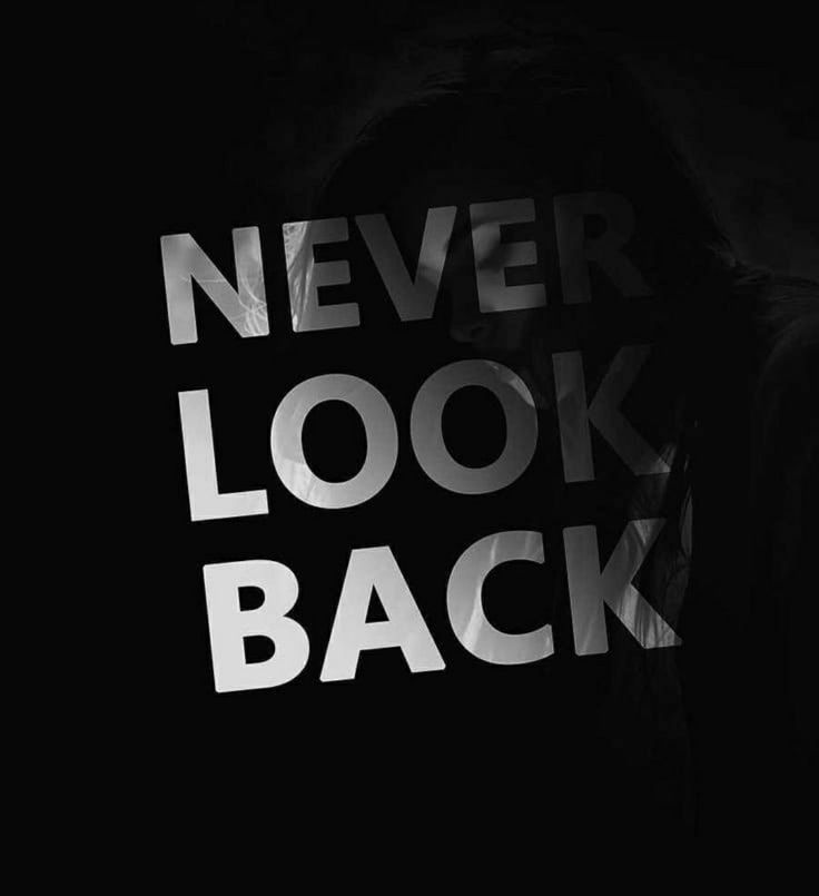 a black and white photo with the words never look back