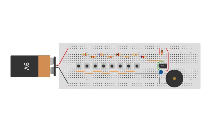 an electronic device with wires attached to it and a battery plugged into the board