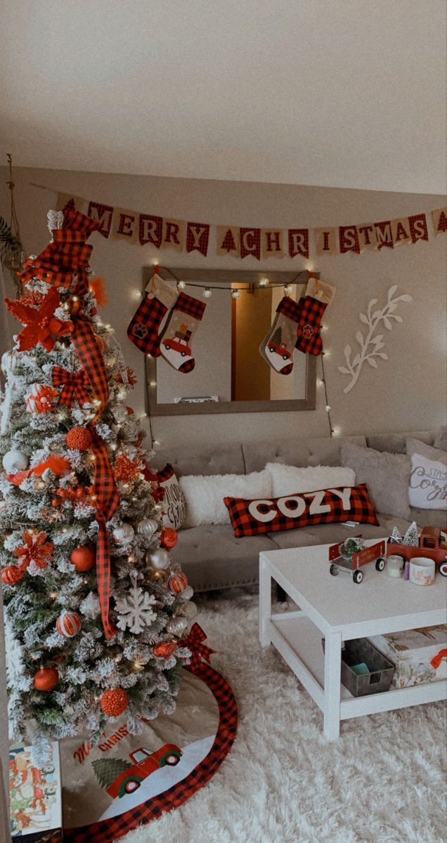 a decorated christmas tree in a living room