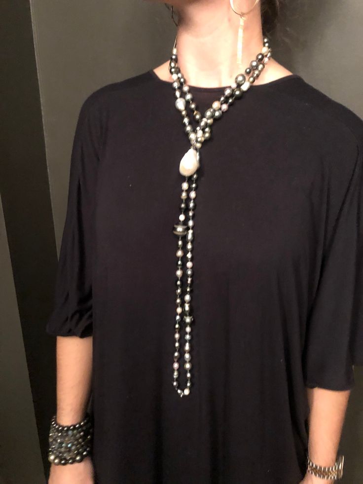 132 South Sea, Tahitian, and Akoya pearls are hand-knotted on silk. A rare “cake-pop” Baroque pearl hangs central to this necklace. Can be worn long, doubled, or three times around the neck. No clasp. 66" with 1.5" drop. Akoya Pearls, Cake Pop, Baroque Pearls, Hand Knotted, Silk, Cake