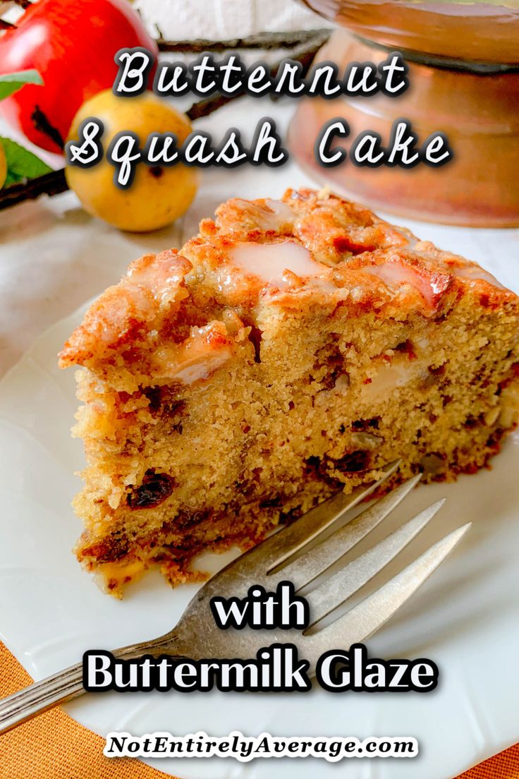 a close up of a piece of cake on a plate with a knife and fork