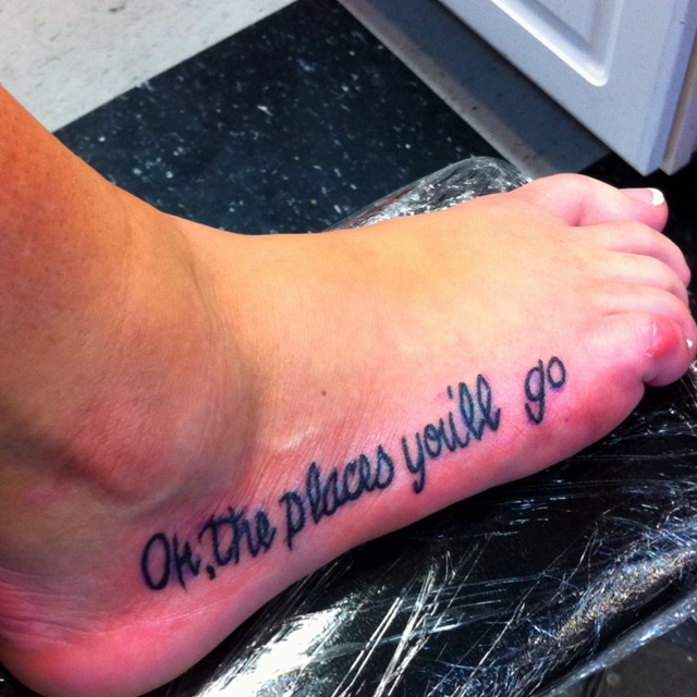 a person with a foot tattoo that says, oh the places you'll go