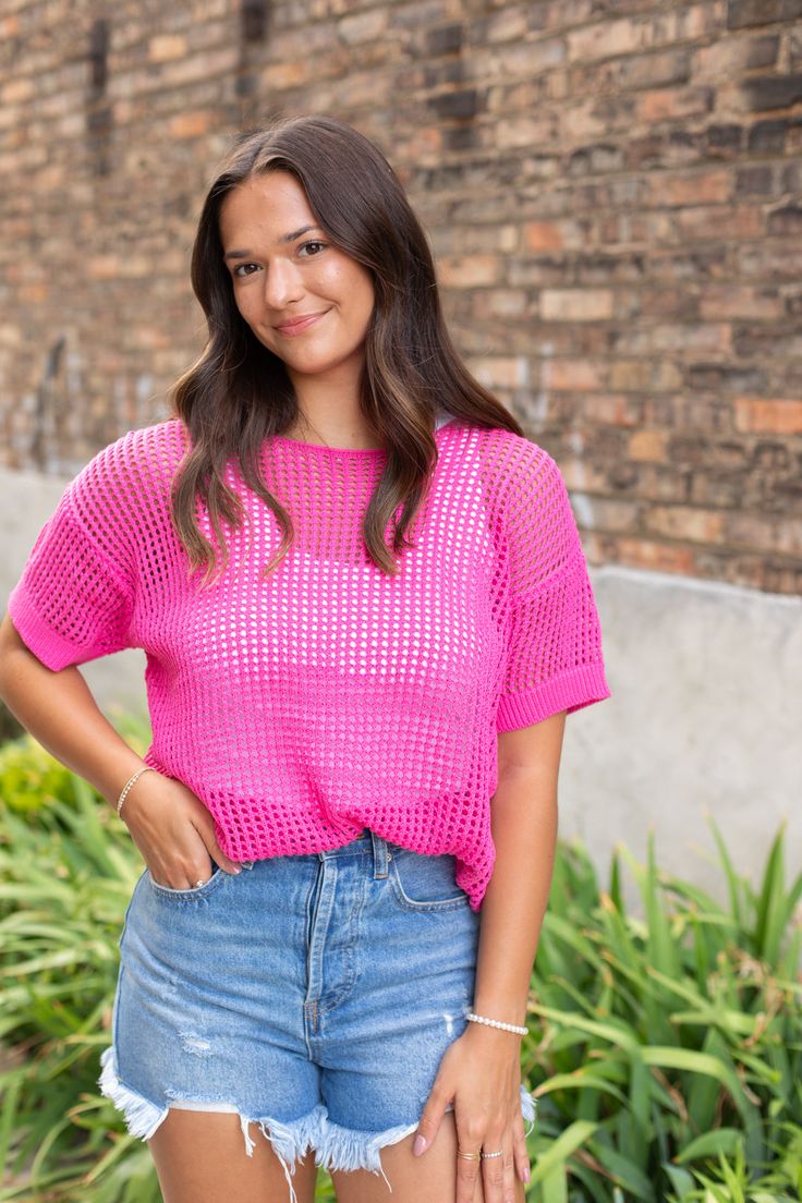 DETAILS Pink is the hot color of the summer and crochet is the texture of the season! This fun open knit short sleeve top has a rounded neckline and drop shoulder. A cute piece to stand out in the crowd! FIT TIP: True to size! Renna is wearing a small [5'6", 145 lbs, banana shape] BRAND: Wishlist Apparel Open knit Drop shoulder Rounded neck 100% Cotton CARE INSTRUCTIONS Wash in cold water, lay flat to dry Gno Outfit, Knit Short Sleeve Top, Living In Yellow, Casual Work Wear, Resort Dresses, Open Knit Sweater, Knit Short, Rounded Neckline, Sweater Sale