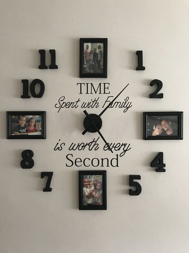 a clock that has some pictures on the front and back of it with words written in black