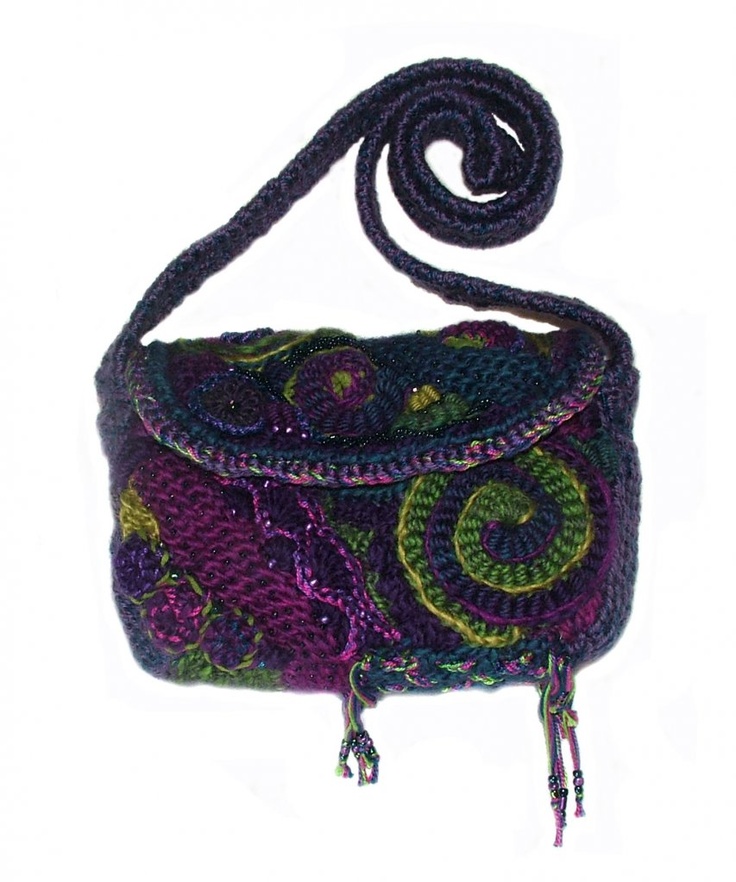 a crocheted purse is shown on a white background