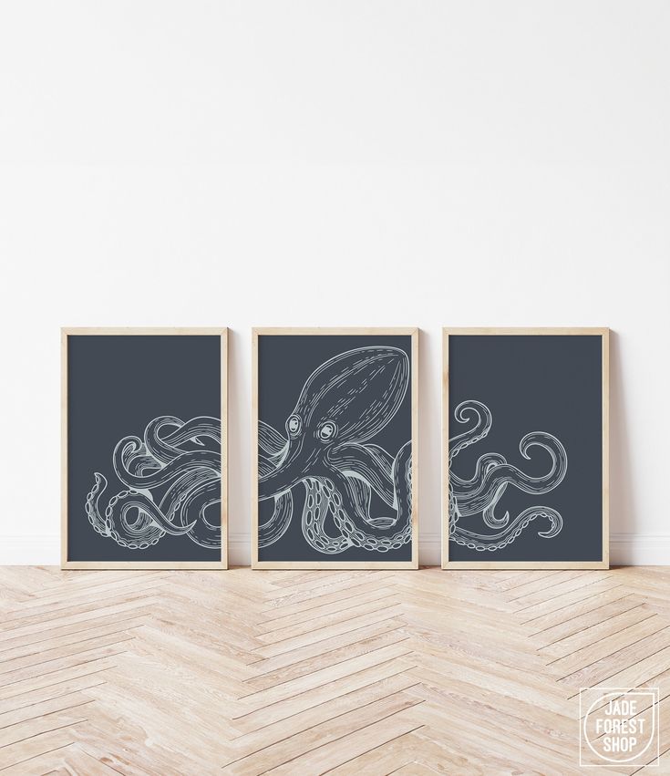 two black and white prints with an octopus drawn on them in front of a wall