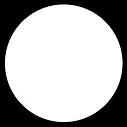 a black and white photo of a round object in the middle of a dark background