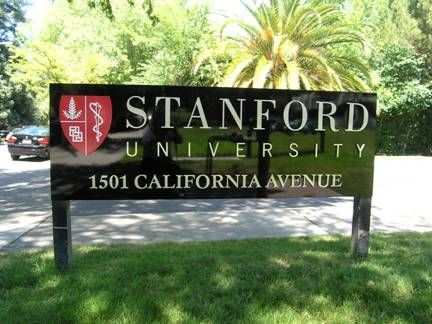 the stanford university sign is in front of some trees