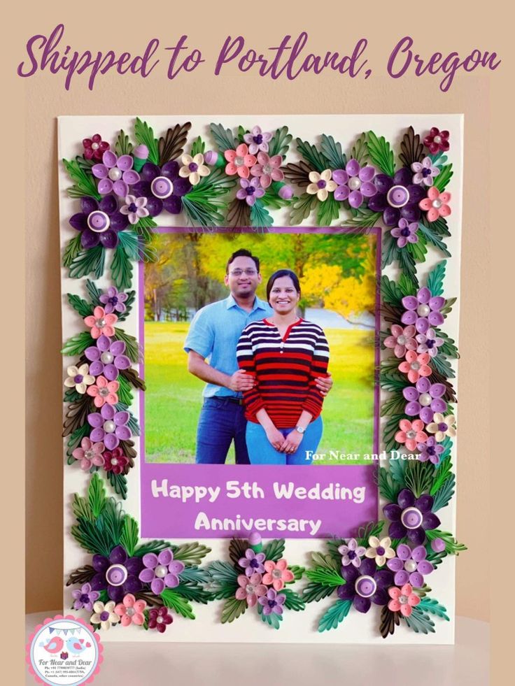 a photo frame with flowers and leaves on it for a wedding anniversary or anniversary gift