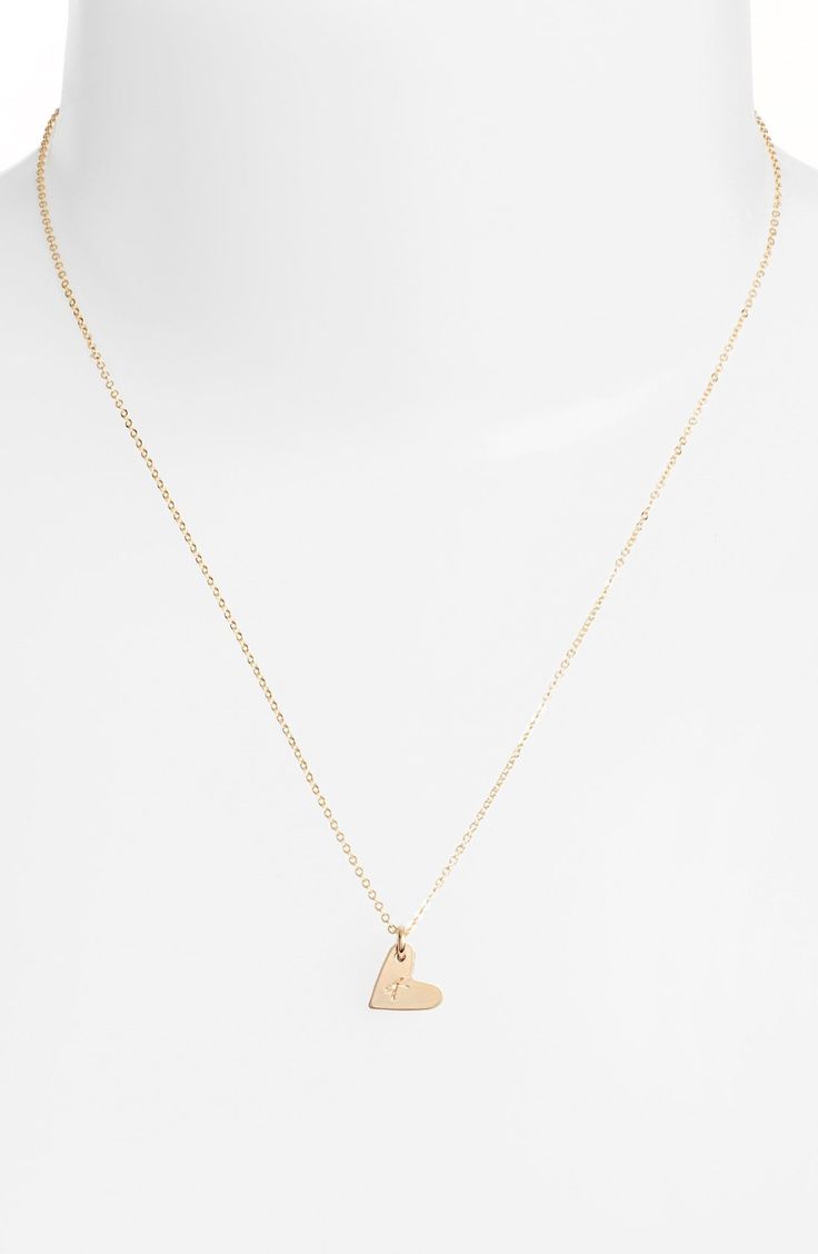 From humble beginnings to a fully staffed warehouse in Oregon, Nashelle remains true to its original purpose-handmade jewelry crafted with love and intention. The heart initial necklace is no different-with a hand-stamped pendant anchored by a single ring, it makes for a perfect layering piece. Style Name:Nashelle 14K-Gold Fill Initial Mini Heart Pendant Necklace. Style Number: 5143637. Available in stores. Minimalist Heart Charm Jewelry For Anniversary, Minimalist Heart Charm Jewelry For Anniversary Gift, Minimalist Heart Beads Jewelry For Mother's Day, Gold Heart Beads Jewelry For Anniversary Gift, Gold Heart Beads Jewelry For Anniversary, Delicate Open Heart Jewelry For Anniversary Gift, 14k Gold Heart Charm Jewelry With Initial Pendant, 14k Gold Filled Heart Charm Jewelry Gift, 14k Gold Jewelry With Heart Charm Initial Pendant