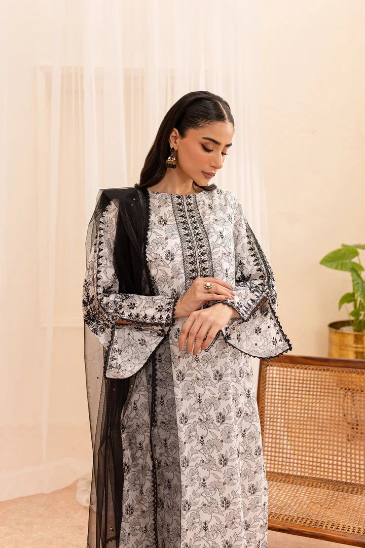 BATIK Narvin 3Pc - Printed Lawn Dress Embrace tradition with this traditional Pakistani women's clothes ensemble. The off white Pima Lawn shirt is highlighted with intricate embroidery at the neckline and printed sleeves with direct embroidery and lace accents. The plain dyed net dupatta, adorned with hand-stitched sequin spread and lace trim, adds elegance. Styled with printed cambric culottes, this ready-to-wear 3pc dress blends cultural heritage with modern fashion. Note: Colors may slightly White Embroidered Long Sleeve Sets, White Long Sleeve Traditional Wear For Eid, Unstitched White Lawn Suit For Traditional Ceremonies, White Embroidered Fitted Lawn Suit, Traditional Black Lawn Suit For Spring, Fitted White Lawn Suit With Floral Embroidery, Fitted Long Sleeve Lawn Suit With Embroidered Border, White Lawn Suit For Eid Ceremonies, White Lawn Suit For Eid And Traditional Ceremonies