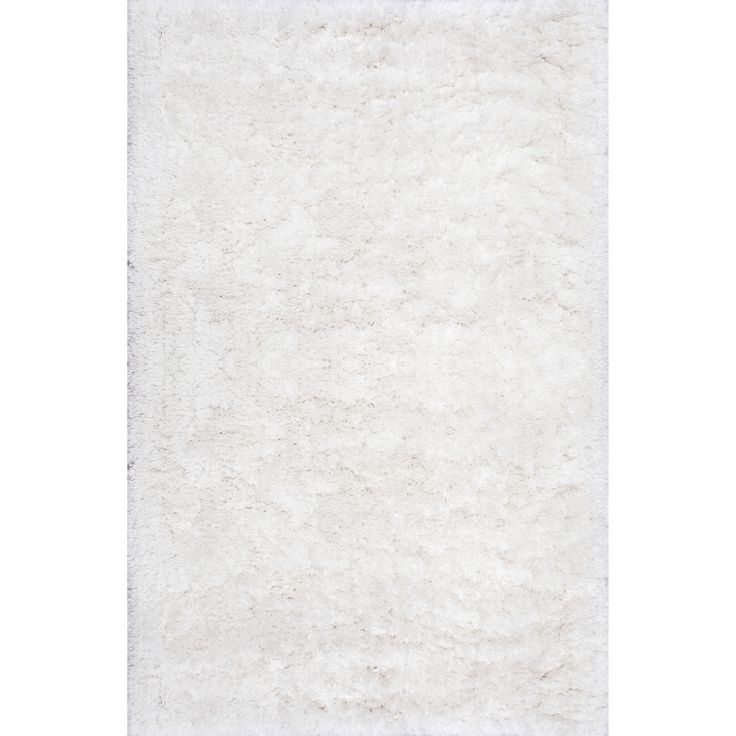 a white rug on a white background with no one in it or someone else to the side