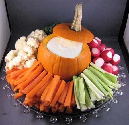 a platter filled with carrots, celery and cauliflower