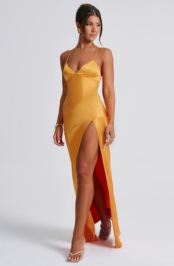 If you're looking for a super soft, romantic silhouette that skims over the body and enhances your figure, meet the Isobel maxi. Made from our silky soft satin with a bias cut, Isobel features a plunge neck, super low back with tie straps and a thigh high split. 



Colour: Tangerine.

Non stretch bias cut satin.

Lined cups with unlined body.

Thigh high split.

Plunge V-neck.

Hugs the figure.

Super low back.

Lace up tie straps to the back.

Maxi length.

Model is an XS and is wearing an XS. Homecoming Dresses Corset, Midi Dress Wedding Guest, Romantic Silhouette, Long Sleeve Homecoming Dresses, Split Long Dress, Homecoming Dresses Long, Elegant Maxi Dress, Maxi Dress Sale, Sparkle Dress