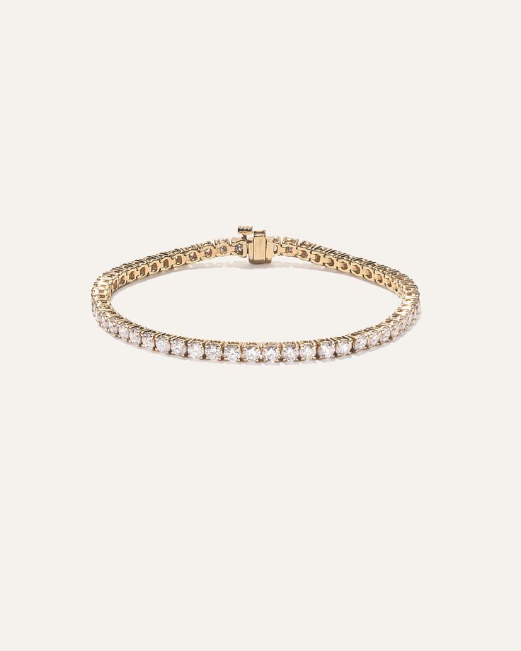 Elevate your everyday elegance with our stunning lab grown diamond tennis bracelet, featuring a classic 4-prong design that showcases each stone's brilliance. Available in two lengths and five different total carat weight options, this bracelet allows you Classic 14k Gold Diamond Bracelet With Vvs Clarity, White Gold Bracelet With Prong Setting, 14k White Gold Round Cut Bracelet, Formal 14k Gold Diamond White Bracelet, Yellow Gold Diamond Bracelet With Vvs Clarity For Wedding, Yellow Gold Diamond Bracelets With Prong Setting, Diamond White Gold Bracelet With 17 Jewels, Gold Round Moissanite Diamond Bracelet, Classic Moissanite Tennis Bracelet For Wedding