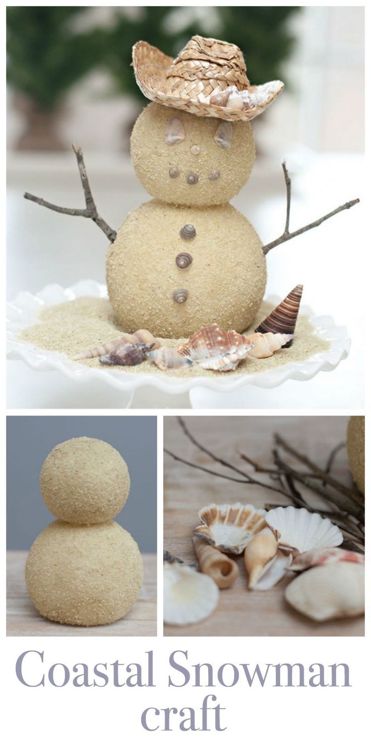 a snowman made out of sand sitting on top of a table next to seashells