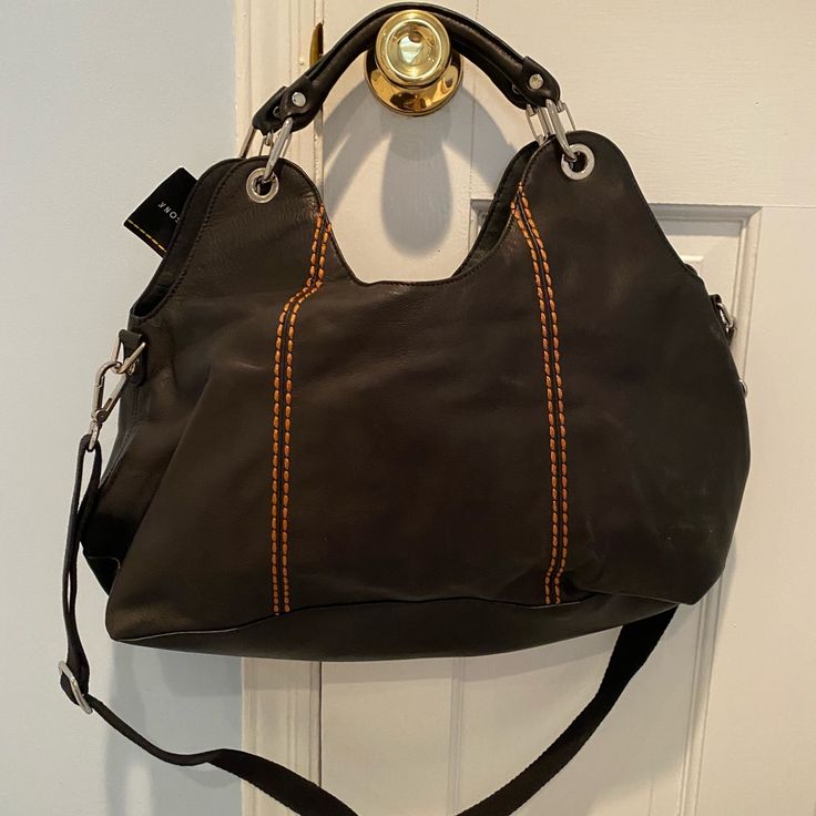 Never Worn! With Tags! In Great Condition. No Sign Of Wear Comes With Dust Bag Has Longer Strap That Is Removable Has Brown/Burnt Orange Stitching Detail Brown Rectangular Shoulder Bag With Gunmetal Hardware, Brown Leather Bag With Gunmetal Hardware, Luxury Brown Shoulder Bag With Gunmetal Hardware, Brown Rectangular Satchel With Gunmetal Hardware, Brown Top Handle Shoulder Bag With Gunmetal Hardware, Black Satchel With Leather Lining For Daily Use, Brown Hobo Bag With Top Handle, Brown Top Handle Hobo Bag For On-the-go, Brown Tote Satchel With Gunmetal Hardware