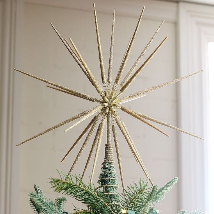 a christmas tree topper in the shape of a star