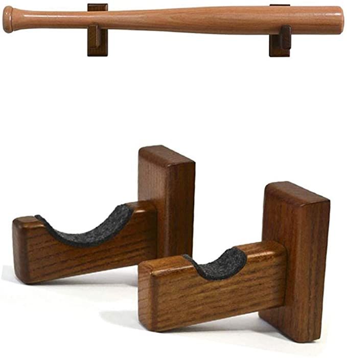 two wooden pegs are attached to the back of a pair of clothes pins and hangers