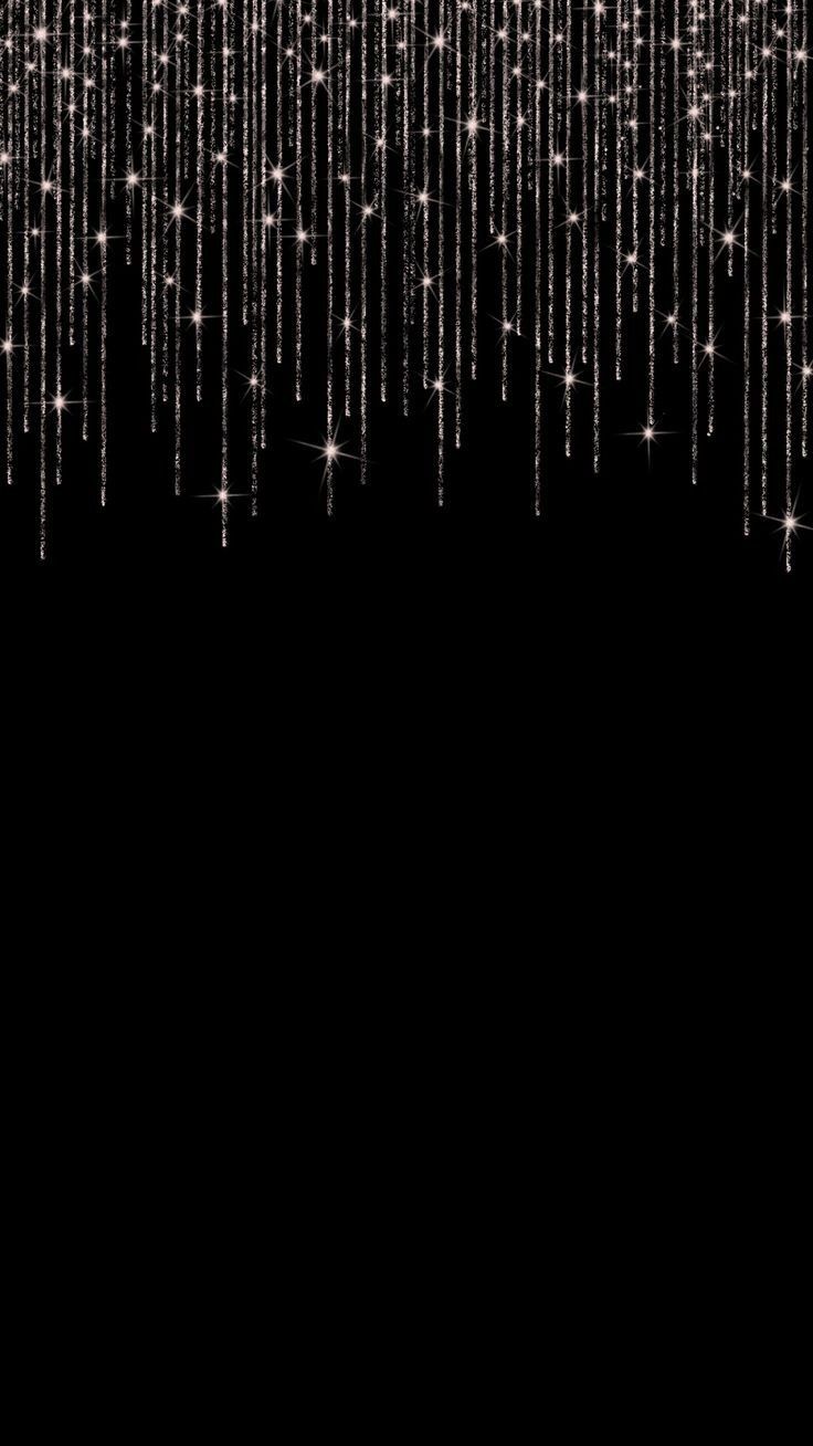 an abstract black and white background with lots of sparkling stars on it's side