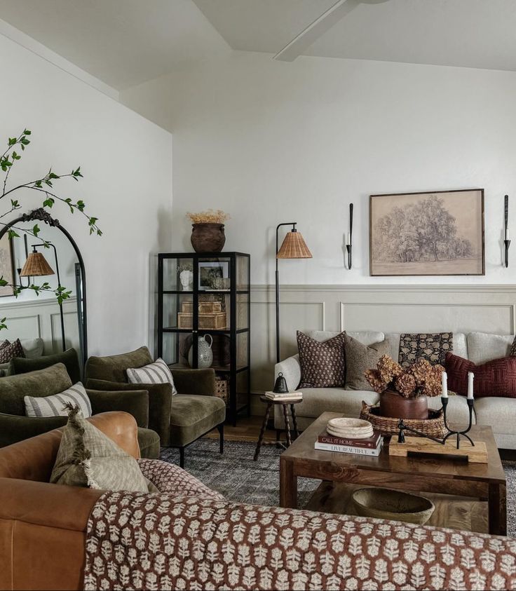 a living room filled with lots of furniture