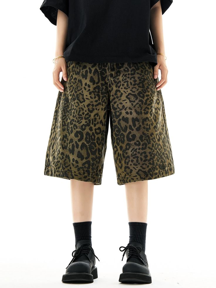 Unleash your wild side with these striking Leopard Print Wide-Leg Bermuda Shorts.
Crafted with a nod to vintage American leisurewear, these shorts boast a timeless leopard print on comfortable washed fabric. The wide-leg design ensures a versatile fit, making them an effortless addition to your relaxed yet stylish wardrobe.
Perfect for mixing and matching, pair these bermuda shorts with a sleek black top to let the print take center stage, or dress them down with a plain white tee for a casual d Wide Leg Cotton Bottoms In Leopard Print, Casual Leopard Print Cotton Bottoms, Casual Tiger Print Summer Bottoms, Casual Tiger Print Bottoms For Summer, Casual Summer Bottoms With Tiger Print, Leopard Print Cotton Shorts For Summer, Summer Leopard Print Cotton Shorts, Lana Condor, Shorts Y2k