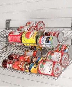 an organized spice rack with canned food on it