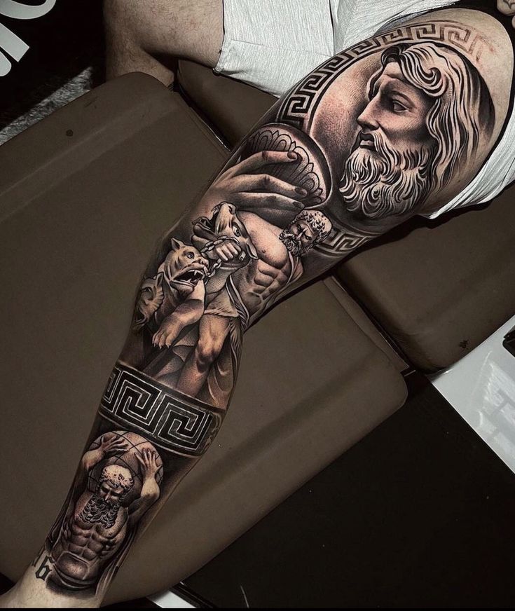 a man's leg with tattoos on it and an image of a person holding a dog