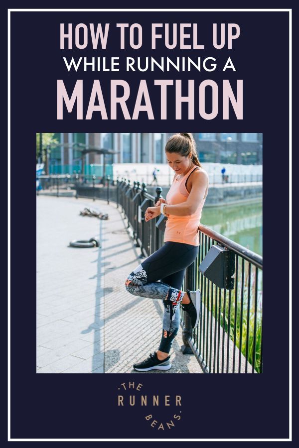 a woman standing on top of a rail next to a fence with the title how to fuel up while running a marathon