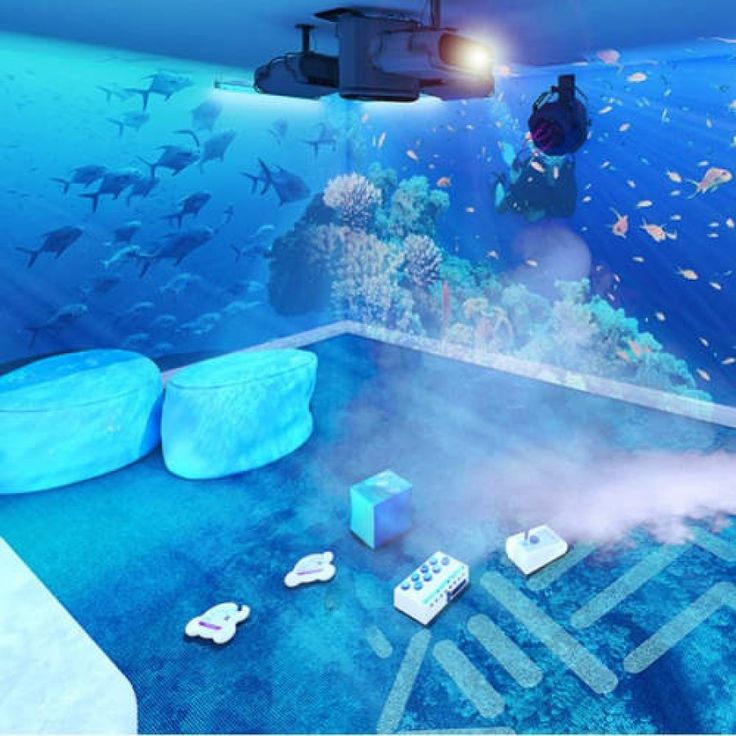 an underwater room with blue water and various objects