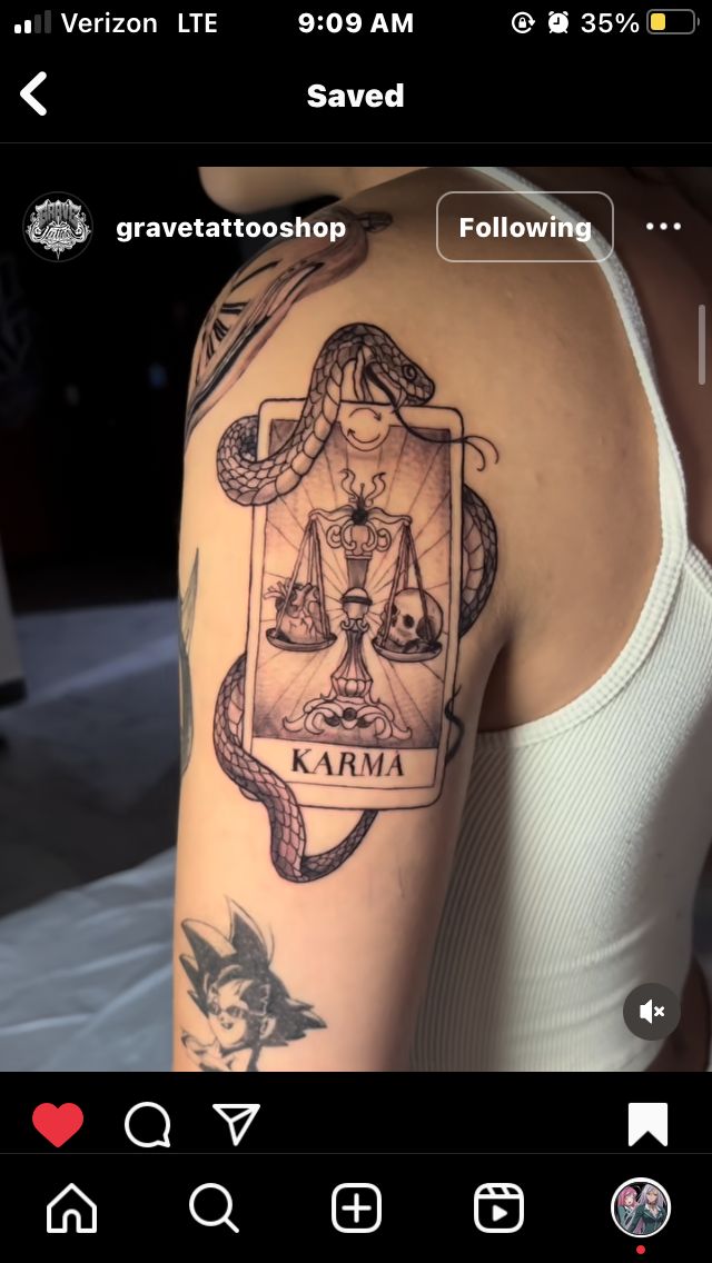 a woman with a tattoo on her arm that reads krama and the scales of justice