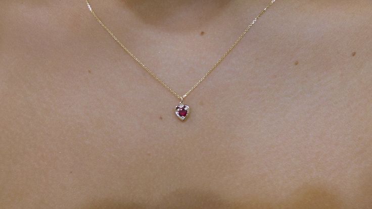 Ruby Necklace/ 14k Gold Heart Necklace/ Mini Heart Necklace/ Dainty Heart Necklace/ Gemstone Necklace/ July Birthstone/ Birthday Gift/ Valentines Gift/ Delicate Ruby Necklace Free Shipping within the USA METAL: 14K YELLOW GOLD 585 STONES: 0.12CT GENUINE RUBY STYLE: MINI HEART NECKLACE/ JULY BIRTHSTONE PURITY: 14K 585 SIZE: HEART IS 6.3MM BY 6.5MM AS IT IS WITH THIS ITEM ALL MY PIECES ARE HAND MADE. AND I STAND BEHIND EVERY PIECE. SATISFACTION GUARANTEED. FIND OUT ABOUT OUR LAYAWAY PAYMENT PLAN A Fine Jewelry Heart Gemstone Necklace For Wedding, Wedding Fine Jewelry Heart Gemstone Necklace, 14k Gold Heart Necklace With Gemstone, Fine Jewelry Heart-shaped Birthstone, Heart Cut Birthstone Necklace In Fine Jewelry Style, 14k Gold Gemstone Heart Necklace For Valentine's Day, Dainty Heart-shaped Birthstone Necklace With Gemstone, Dainty Heart-shaped Gemstone Jewelry, Yellow Gold Gemstone Heart Necklace