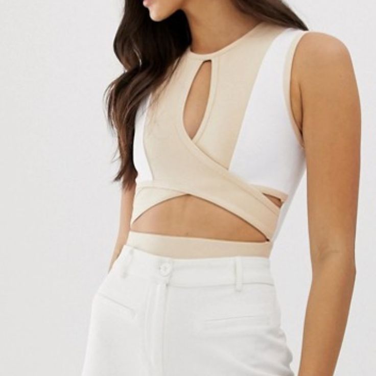 The Girl Code Tan & White Bandage Cutout Body Suit New With Tags Two Clasps At Bottom Size 14 But Fits More Like A 10-12 Imo Smoke Free Pet Friendly Home Bundle And Save - Ships Asap! Fitted White Cutout Tops, Chic White Bandage Crop Top, White Cutout Bodysuit For Spring, White Cutout Fitted Bodysuit, Fitted White Cutout Bodysuit, White Bandage Top For Spring, Chic White Bandage Top, Spring White Cutout Bodysuit, Spring White Bandage Tops