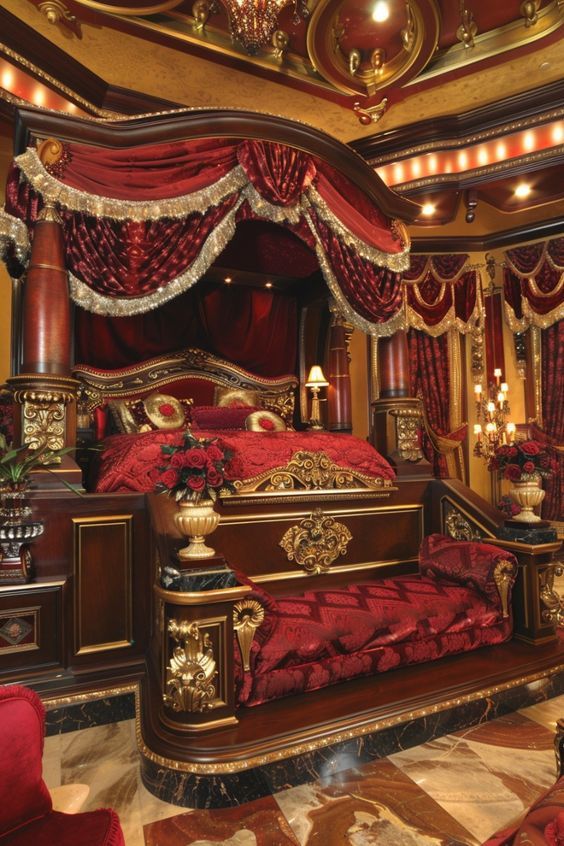 a fancy bedroom with red and gold decor