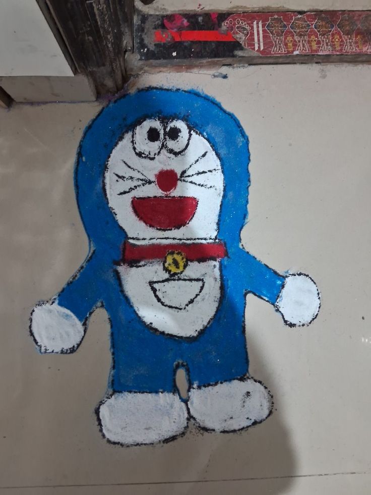 a drawing of a cartoon character on the ground