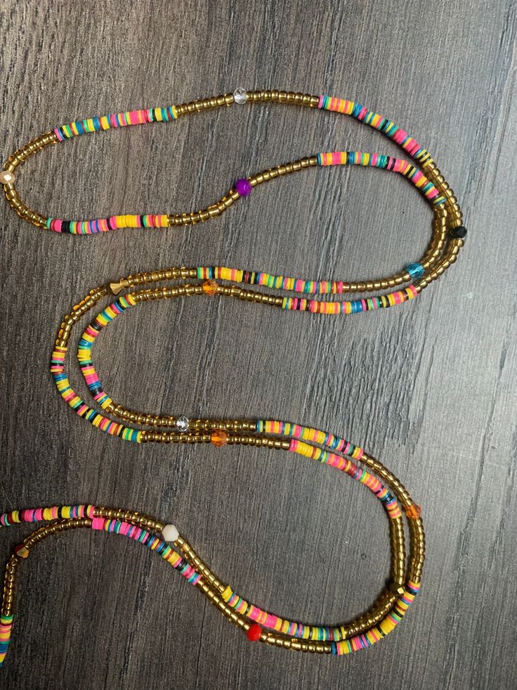 These beads come in TIE ON only, they are 45" long and self adjustable based on your waist size. ★ The listed prices are for one strand each. For multiple strands you'll have to indicate from the quantity section in your cart. Uses of Waist beads ★ Cultural and Spiritual Reasons ★Waist beads as ornaments as well as for symbolic adornment, ★ which serves as a sign of wealth, femininity or aristocracy, as well as spiritual well-being. ★ Weight-loss Management ★Self Love/ Confidence ​ Vinyl Waist Beads, Waist Beads Inspiration, Waist Bead Designs, Double Strand Necklace For Beach, Adjustable Double Strand Beaded Necklace For Beach, Adjustable Multicolor Lariat Long Necklace, Adjustable Colorful Waist Beads For Summer, Multicolor Lariat Beaded Necklaces For Beach, Multicolor Lariat Beaded Necklace For Beach