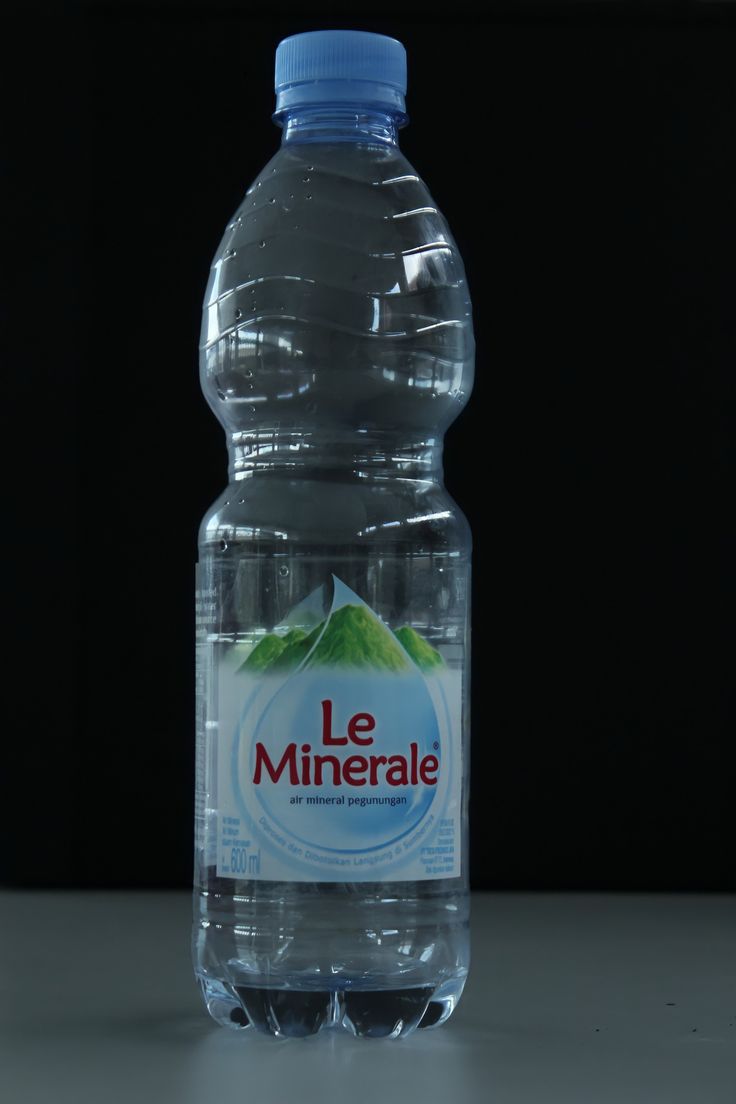 a bottle of mineral water sitting on a table