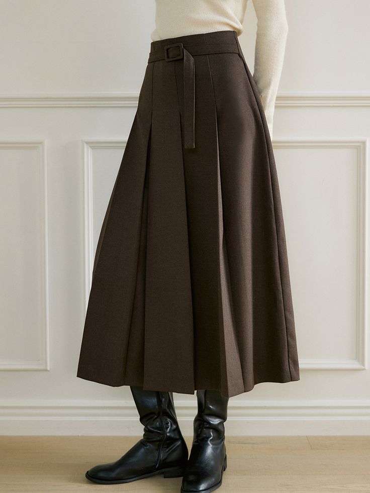 Editor's NotesThis product is a long skirt distinguished by its unevenly spaced, innovative pleated details. A clean waistline without a waistband gives the illusion of elongated legs. The belt detail, made from the same fabric, allows for a statement look when paired with a minimal top.- The long skirt showcases unique pleated details with asymmetrical spacing.- Its clean waistline enhances the appearance of length for a flattering effect.- Includes a fabric belt detail for a striking look when Chic A-line Winter Bottoms, Elegant A-line Bottoms For Winter, Fitted Pleated Skirt With Belt Loops For Fall, Elegant Spring Pleated Skirt With Belt, Elegant Pleated Skirt With Belt, Formal Pleated A-line Bottoms, High Waist Fitted Belted Pleated Skirt, Fitted High Waist Belted Pleated Skirt, Fall Workwear Pleated Skirt With Belt Loops