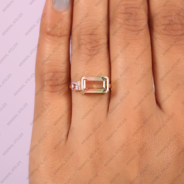 Tourmaline With Pink Sapphire Stackable Ring, Two Stone Ring, Bicolor Gemstone Ring, Birthday, Anniversary Fine Gift Jewelry PRODUCT SKU- 3043 MAIN STONE - Tourmaline STONE COLOR - Bicolor STONE SHAPE - Octagon STONE WEIGHT - 3.28Ct Approx. STONE BIRTH STONE MONTH - Octagon MAIN STONE - Pink Sapphire  STONE COLOR - Pink STONE SHAPE - Princess STONE WEIGHT -0.19Ct Approx. STONE BIRTH STONE MONTH -September  THIS RING ALSO AVAILABLE IN OTHER GESMTONES MORE OPTION IN GOLD COLOR -  Rose Gold, White Gold and Yellow Gold Ring Size : US 7 (Resizable and charge apply above US 8) ▷ Returns & Exchanges I understand how important it is to love what you buy! If, for any reason, you are not satisfied with your purchase, I gladly accept returns, exchanges, and cancellations. * Please contact me within 2 Baguette Cut Tourmaline Jewelry For Weddings, Emerald-cut Tourmaline Wedding Jewelry, Wedding Rings With Baguette Cut Tourmaline, Emerald Cut Tourmaline Wedding Jewelry, Baguette Cut Tourmaline Wedding Ring, Emerald Cut Tourmaline Promise Ring, Tourmaline Gemstone Ring For Wedding, Wedding Tourmaline Gemstone Rings, Anniversary Tourmaline Crystal Ring With Gemstone