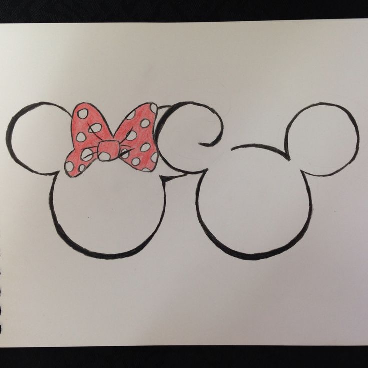 a drawing of minnie mouse with a red bow