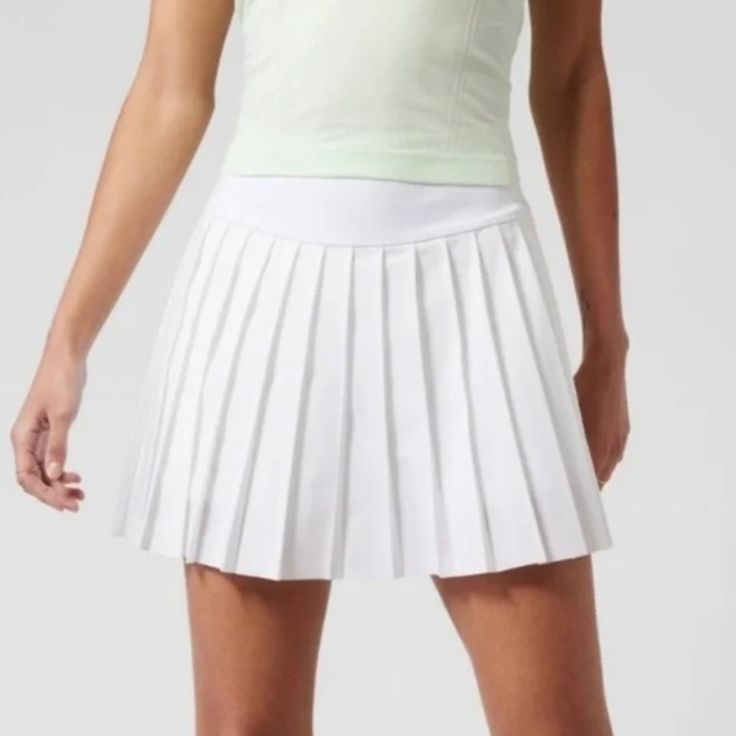 New With Tags! Athleta - Levitate Skort - Size Xxs (Fits Like An Xs) - White - Built In Shorts - Zip Pocket In Back Sporty Fitted Skort For Sports, Sporty Fitted Tennis Skirt, White Moisture-wicking Tennis Bottoms, White Tennis Activewear For Spring, White Spring Tennis Activewear, Fitted Athleisure Bottoms For Golf, White Sportswear Tennis Bottoms, White Sporty Tennis Bottoms, White Tennis Sportswear Bottoms