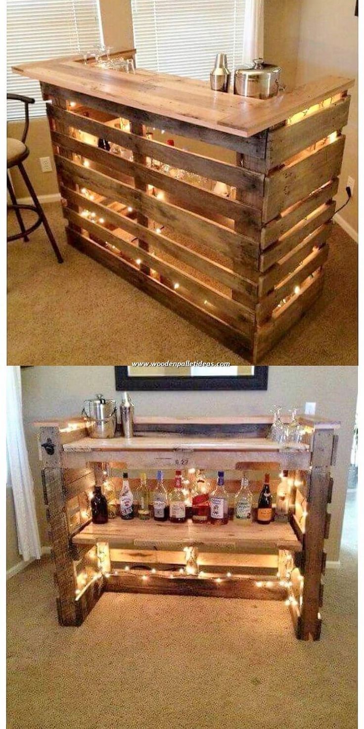 an old pallet is transformed into a bar with lights on the top and bottom